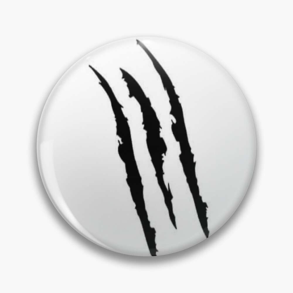 Black claw marks on a white circular button.